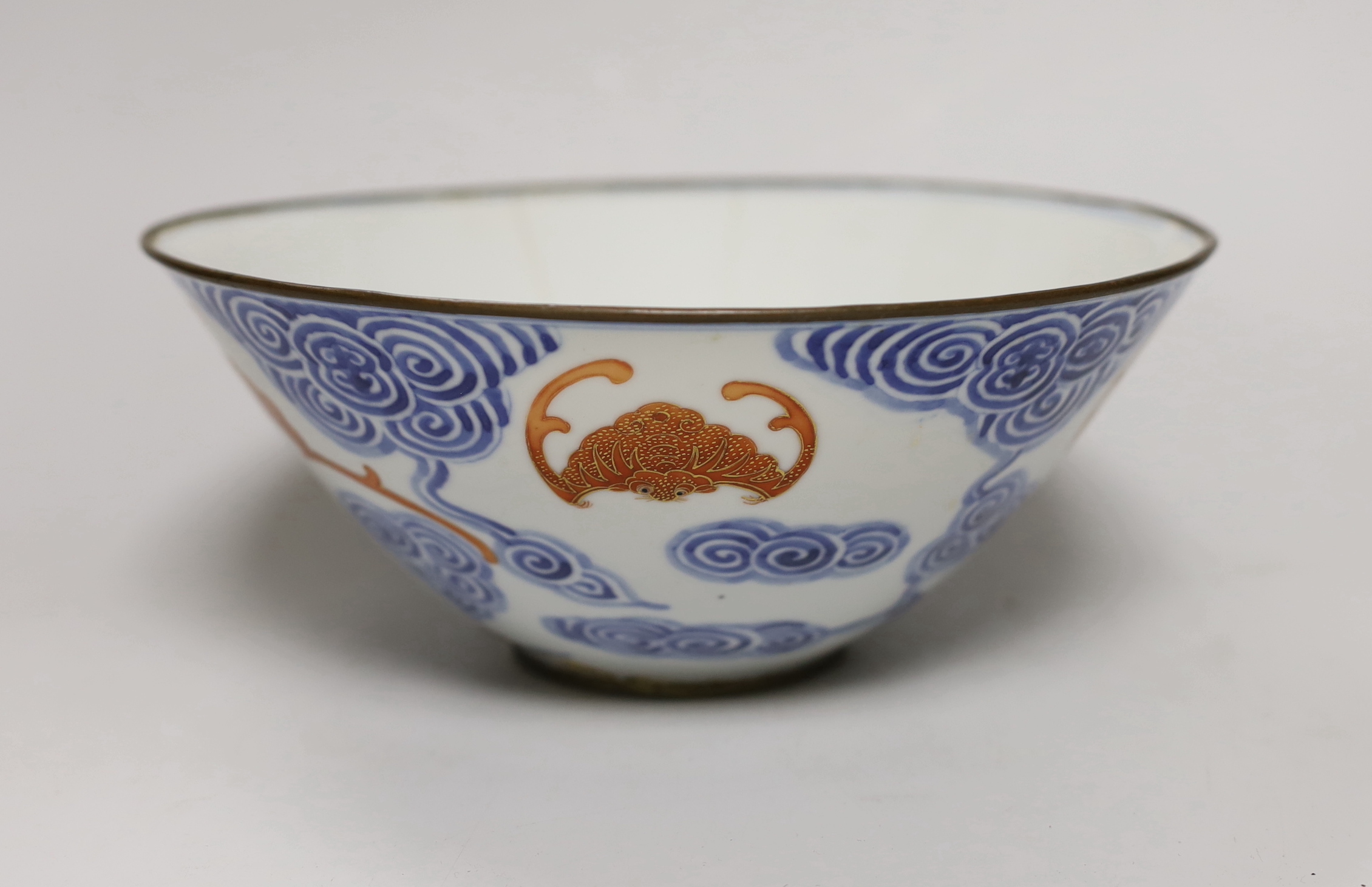 A 19th century Chinese blue and white bowl with iron-red bats, 23cm diam.